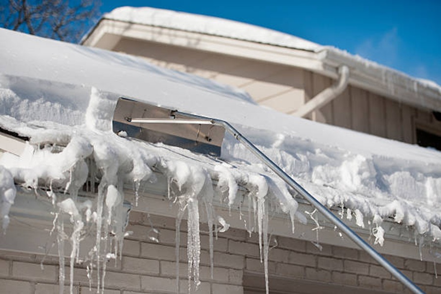 Tackling Roof Snow Removal How to Protect Your Home Before and After a Snow Storm